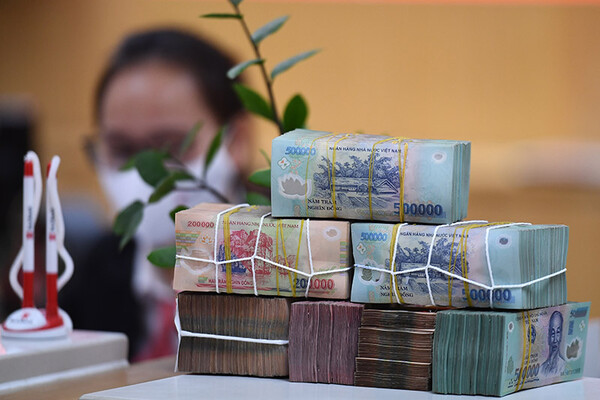 Vì sao được ‘bật đèn xanh’ nhưng các nhà băng vẫn thận trọng phân bổ kết quả kinh doanh