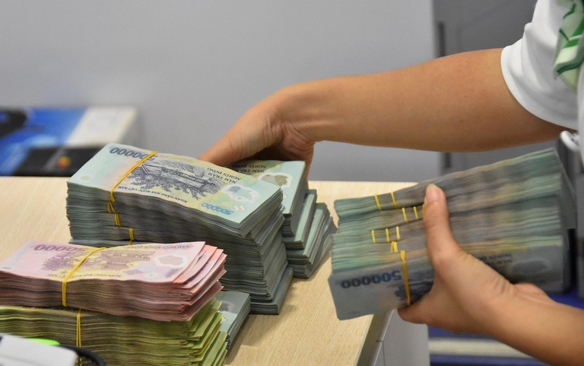 Biên lãi ròng của ngân hàng có thể thu hẹp khi tiếp tục siết vốn ngắn hạn cho vay trung, dài hạn