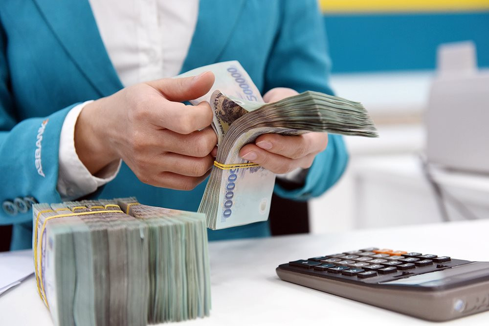 Nỗi lo bẫy thanh khoản hiện hữu khi tiền gửi ngân hàng chậm lại