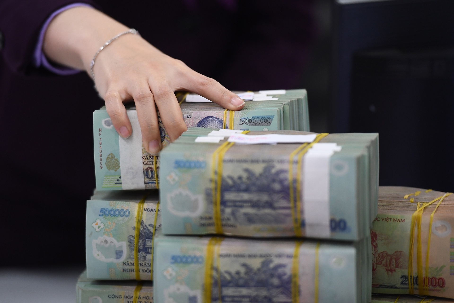 Nhiều ngân hàng có thể nhận khoản thu bất thường lớn từ việc xử lý nợ trong năm 2024